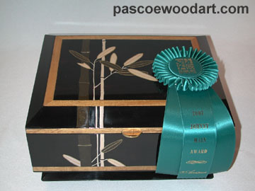 Ebonized cherry with handpainted artwork by pigmented epoxy inlay - Bamboo