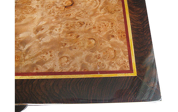 Handcrafted box top close-up - Maple burl center framed in African blackwood with Ceylon satinwood and bloodwood striping